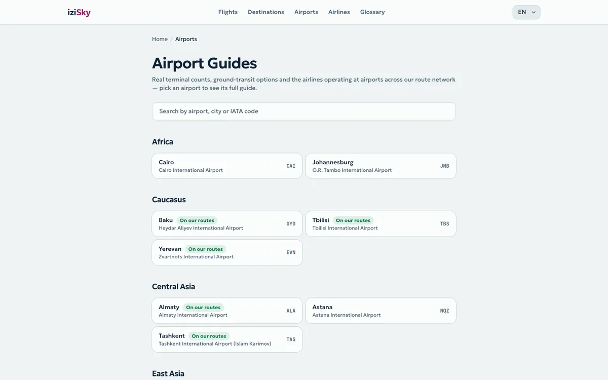 The izisky.com airport guides page: airports grouped by region, each with its IATA code, the ones on iziSky routes marked